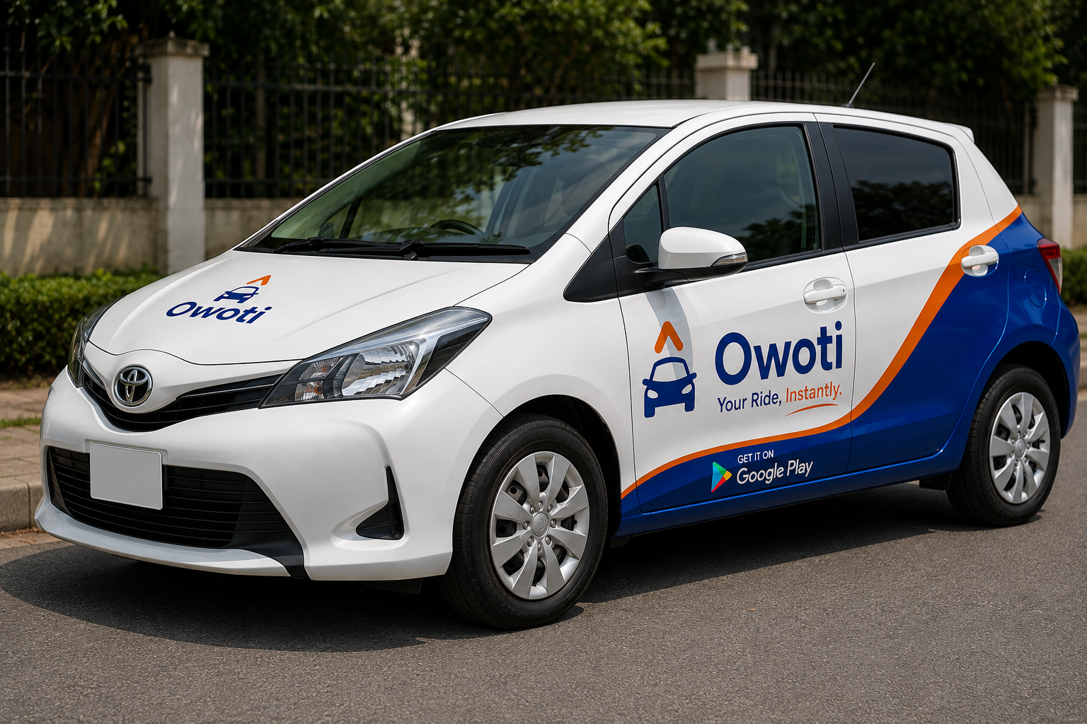 Owoti branded delivery motorcycle moving through the city